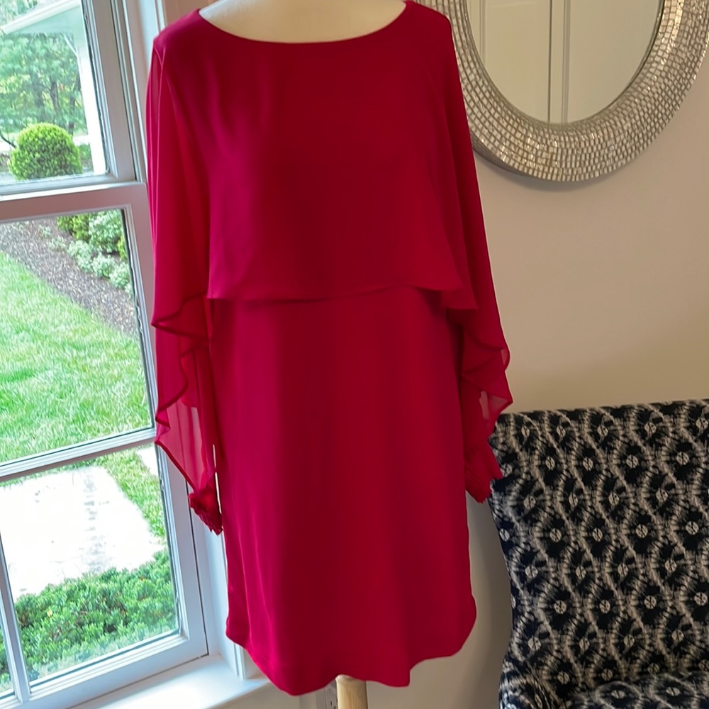 Caplet affect shear sleeve shirt dress. Slim contemporary silhouette